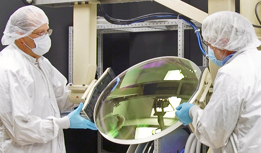 Large Spherical Optic with Coating Technicians